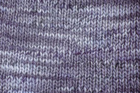 Wool scarf texture close up. Knitted jersey background with a relief pattern. Stock Photos
