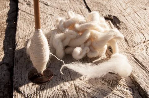 Wool spinner close up. Stock Photos