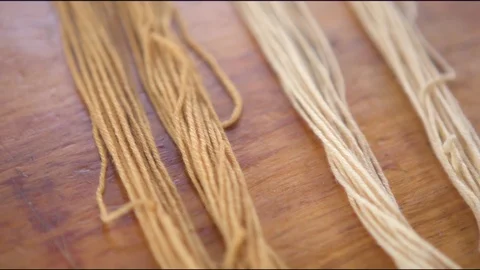 Wool on wooden table Video stock 76094989