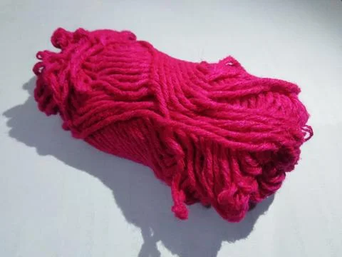 Wool yarn on a white surface. Fotos Stock