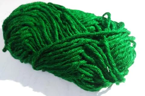Wool yarn on a white surface Stock Photos