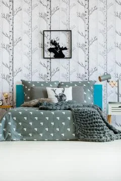 Woolen blanket on the bed Stock Photos