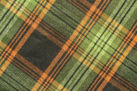Woolen fabric with an slanting checkered pattern Stock Photos