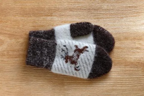 Woolen mittens with deer Stock Photos