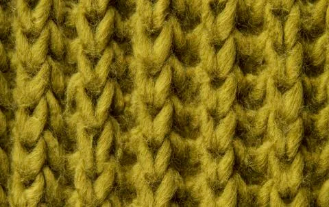 Woolen texture background, knitted wool fabric, green hairy fluffy textile Stock Photos