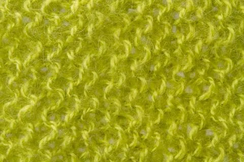 Woolen texture background, knitted wool fabric, green hairy fluffy textile Stock Photos