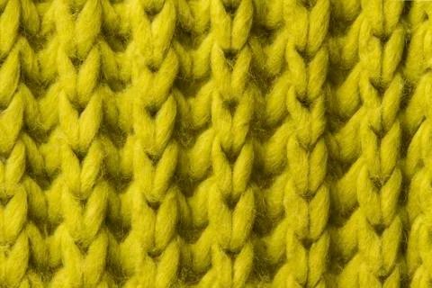 Woolen texture background, knitted wool fabric, green hairy fluffy textile Stock Photos