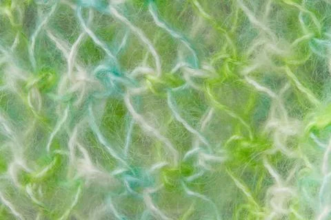 Woolen texture background, knitted wool fabric, green hairy fluffy textile Stock Photos