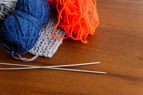 Woolen thread, knitting, knitting needles on wooden table 写真素材