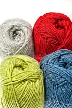 Woollen thread and knitting needle. needlework accessories on white backgroun Stock Photos