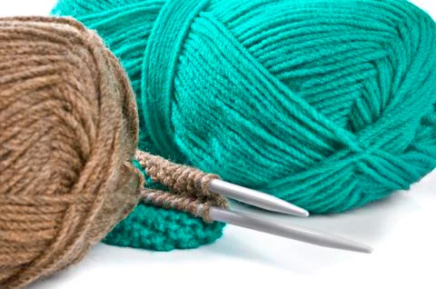 Woollen thread and knitting needle. needlework accessories on white backgroun Stock Photos