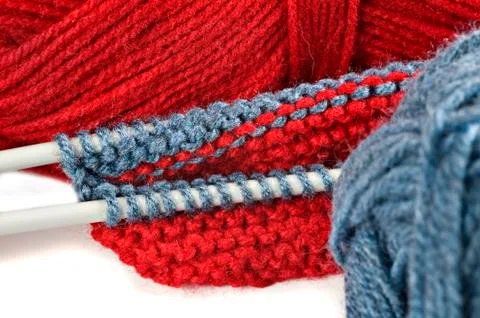 Woollen thread and knitting needle. needlework accessories on white backgroun Stock Photos