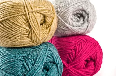 Woollen thread and knitting needle. needlework accessories on white backgroun Stock Photos