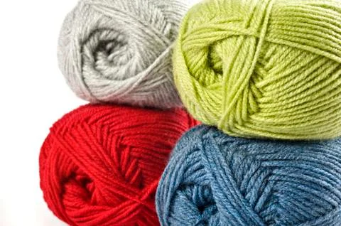Woollen thread and knitting needle. needlework accessories on white backgroun Stock Photos