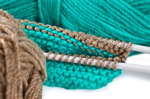 Woollen thread and knitting needle. needlework accessories on white backgroun Stock Photos