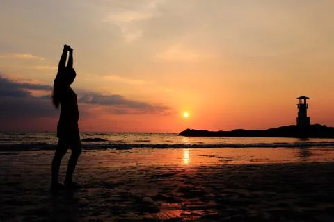 Woomen exercise sunset Stock Photos