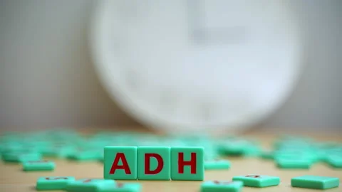 The word ADHD. Small colorful cubes with letters on them. Attention Deficit Stock Footage 208961031