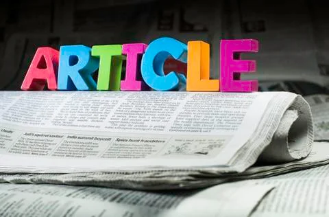 Word article on newspaper Stock Photos