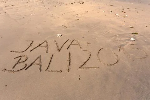 Word Bali Java 2015 writing in sand Photos