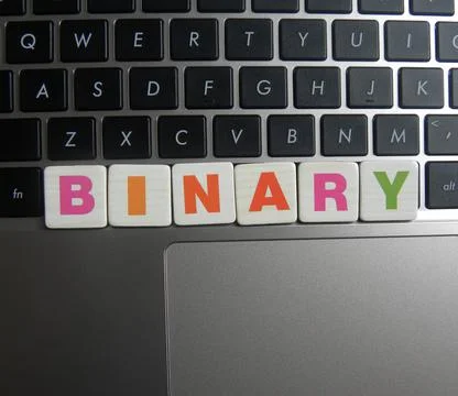 Word Binary on keyboard background Foto stock