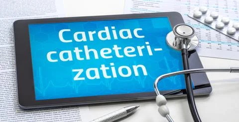The word Cardiac catheterization on the display of a tablet Stock Photos