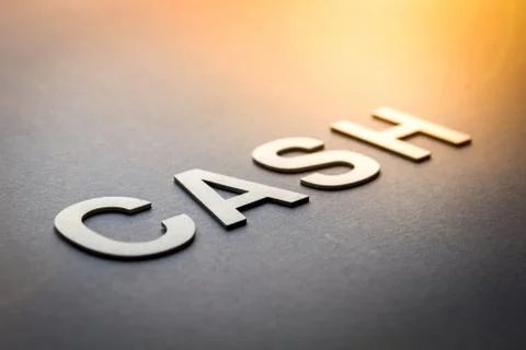 Word cash written with white solid letters 스톡 사진