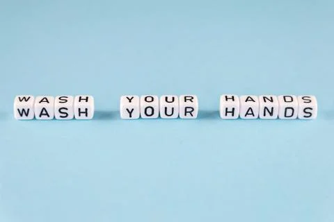 Word composed with cubes on a blue background Stock Photos