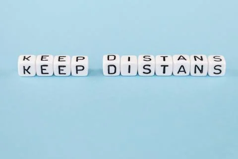 Word composed with cubes on a blue background Stock Photos