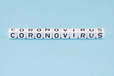 Word composed with cubes on a blue background Stock Photos