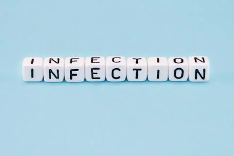 Word composed with cubes on a blue background Stock Photos