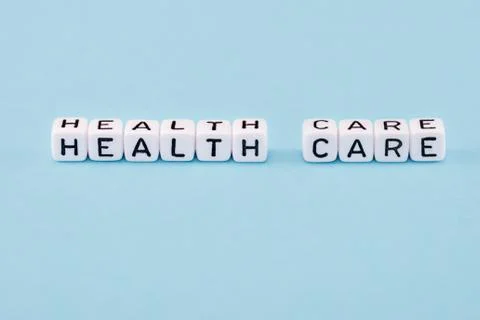 Word composed with cubes on a blue background Stock Photos