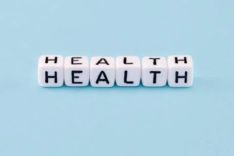 Word composed with cubes on a blue background Stock Photos