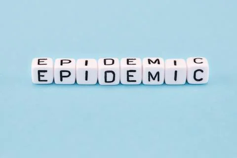 Word composed with cubes on a blue background Stock Photos