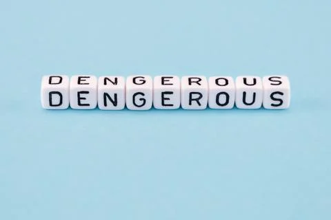 Word composed with cubes on a blue background Stock Photos