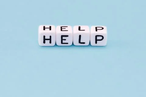 Word composed with cubes on a blue background Stock Photos
