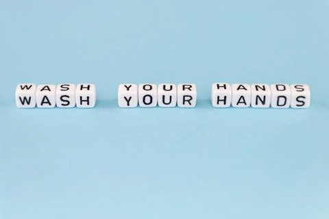 Word composed with cubes on a blue background Stock Photos