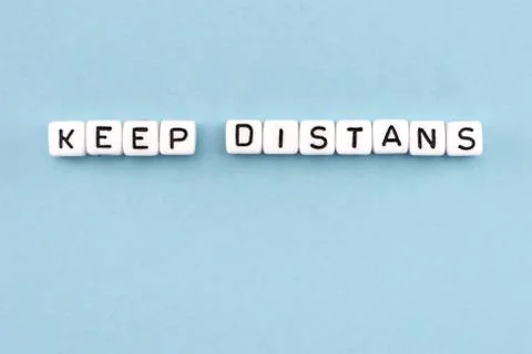 Word composed with cubes on a blue background Stock Photos