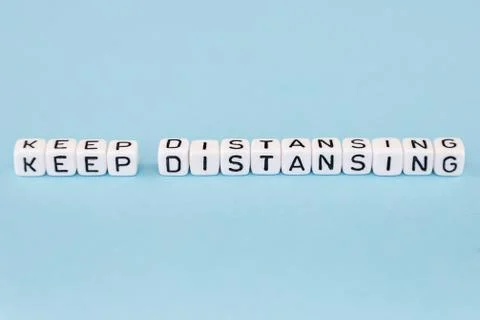 Word composed with cubes on a blue background Stock Photos