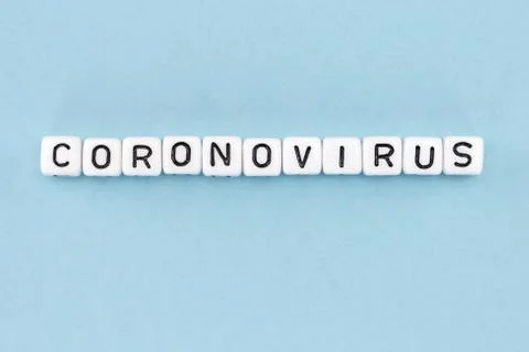 Word composed with cubes on a blue background Stock Photos