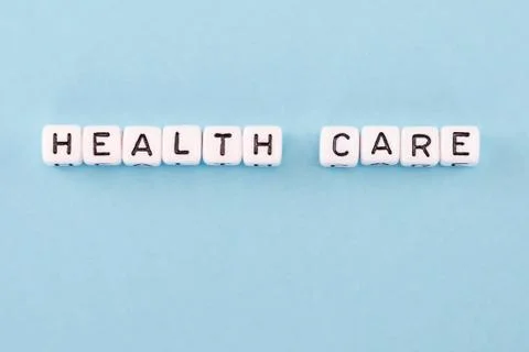 Word composed with cubes on a blue background Stock Photos