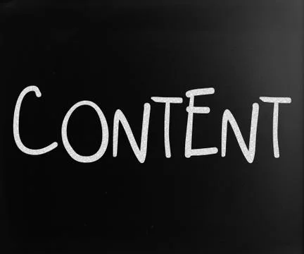 The word "content" handwritten with white chalk on a blackboard Ilustración de archivo