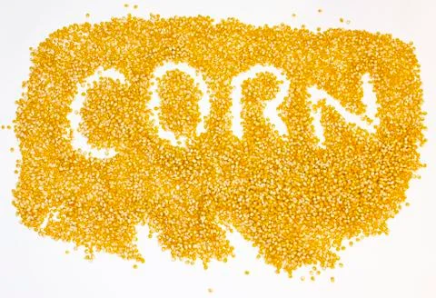 Word "corn" written on dried corn grains. Stock Illustration