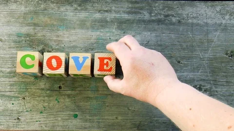 Word coverage built of wooden blocks Stock Footage 79849476