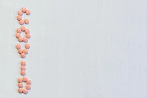 The word COVID from the tablets is on a white table. The global problem of th Stock Photos