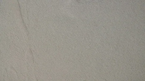 The word "creative" slowly appears on sand 스톡 동영상 80052883