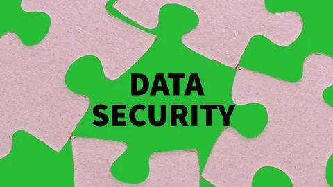 The word data security in the gap of the puzzle Stock Photos