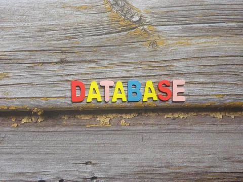 Word Database on wood background Stock Photos