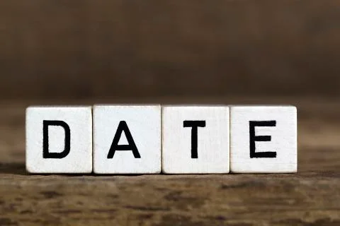 The word date written in cubes Stock Photos