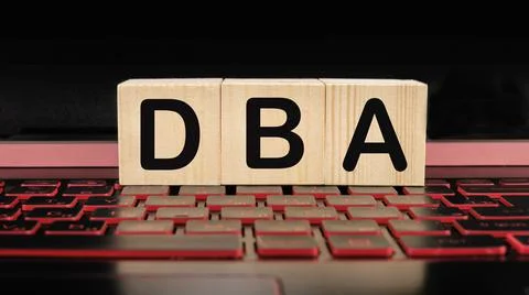 Word DBA Database administrator on keyboard background Stock Photos