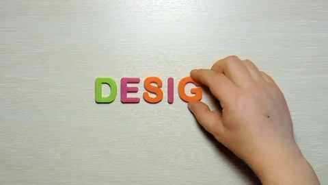 Word design is made up of plastic colored letters Stock Footage 79848774